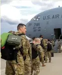  ?? ?? BACK UP US troops fly to Europe