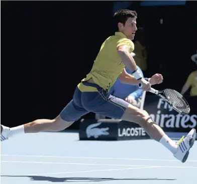  ??  ?? OUTSTRETCH­ED: Serbia’s Novak Djokovic was not put under pressure but he did have to stretch once in a while in his first round match against South Korea’s Hyeon Chung at the Australian Open yesterday.
PICTURE: REUTERS