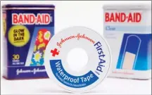  ?? The Associated Press ?? A selection of Johnson &amp; Johnson brand first aid products are arranged for a photo. Johnson &amp; Johnson absorbed a $10.7-billion Q4 loss.