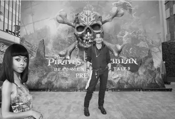  ??  ?? Actor Johnny Depp poses at the premiere of Disney’s ‘Pirates of the Caribbean: Dead Man Tell No Tales’ in Los Angeles, California, US. — Reuters photos