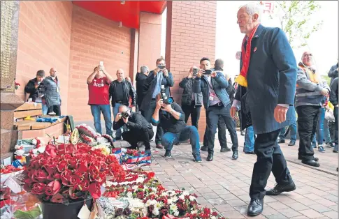  ??  ?? Jeremy Corbyn lays a wreath at Anfield yesterday