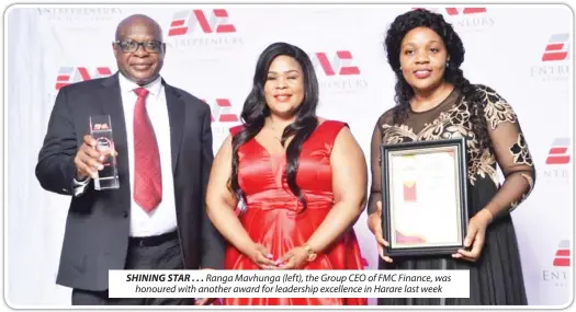  ?? ?? SHINING STAR . . . Ranga Mavhunga (left), the Group CEO of FMC Finance, was honoured with another award for leadership excellence in Harare last week