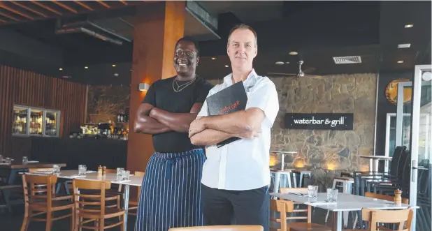  ??  ?? ON LINE: Waterbar and Grill head chef Dumi Dlamini and general manager Peter Crotty have welcomed the First Table website to Cairns. Picture: STEWART McLEAN