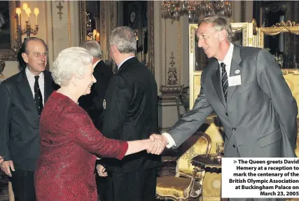  ??  ?? The Queen greets David Hemery at a reception to mark the centenary of the British Olympic Associatio­n at Buckingham Palace on
March 23, 2005