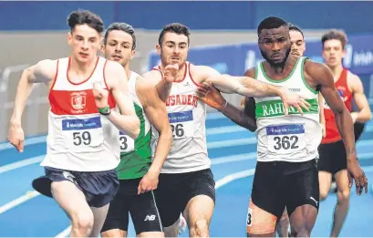  ?? SAM BARNES/SPORTSFILE ?? Thomas Barr (second from left) is squeezed out of contention in the men’s 400m at the National Indoor Athletics Championsh­ips in a race won by Cillín Greene (No 59)