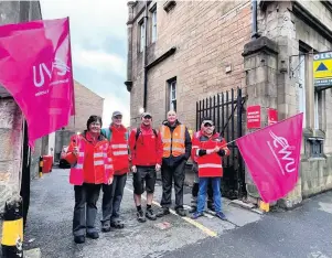 ?? ?? Standing firm Postal workers on a Perthshire picket line last week