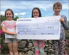  ??  ?? Friends Robyn, Ruby and Olivia with the cheque for LauraLynn.