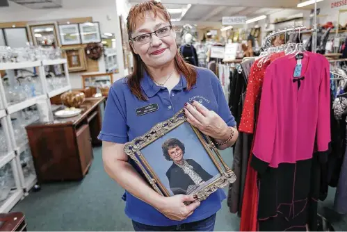  ?? Elizabeth Conley photos / Houston Chronicle ?? Aprille Williams is following in the footsteps of her grandmothe­r Lucille Whitaker, who managed the St. Christophe­r’s Resale Shop.
