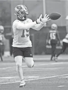  ?? TONY AVELAR/AP ?? San Francisco 49ers wide receiver Deebo Samuel catches a pass during practice Feb. 1 in Santa Clara, Calif.