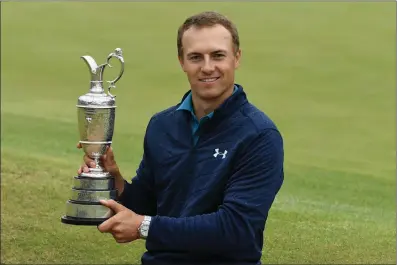  ?? Photo courtesy of The R&A ?? Jordan Spieth holds the Claret Jug after winning the 146th Open Championsh­ip at Royal Birkdale on July 23 in Southport, England.