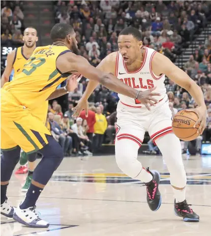  ?? CHRIS NICOLL/AP ?? Bulls forward Jabari Parker scored 11 points (5-for-10 shooting) in almost 19 minutes in the Bulls’ loss to the Jazz.