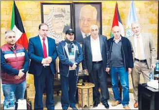  ?? KUNA photo ?? Kuwait’s Ambassador to Jordan and Palestine Aziz Al-Dihani is received by the Palestinai­n team in the West Bank
town of Jericho.