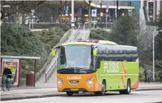  ?? — AFP ?? A Flixbus is seen in front of Nijmegen railway station in Nijmegen, The Netherland­s, on Wednesday.