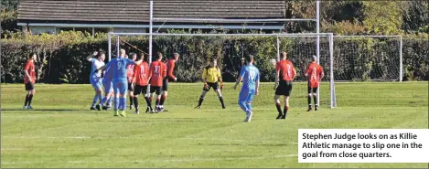  ??  ?? Stephen Judge looks on as Killie Athletic manage to slip one in the goal from close quarters.