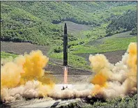  ?? AP/Korean Central News Agency ?? This photo distribute­d by the North Korean government shows what was said to be the launch of a Hwasong-14 interconti­nental ballistic missile Tuesday in North Korea’s northwest.