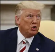  ?? ALEX BRANDON — THE ASSOCIATED PRESS ?? President Donald Trump speaks during a meeting with Romanian President Klaus Iohannis in the Oval Office of the White House on Tuesday. He continues to bring up unfounded conspiracy theories about Google.