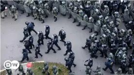  ??  ?? Belarusian riot police block the road to stop demonstrat­ors during an opposition rally to protest the official presidenti­al election results in Minsk