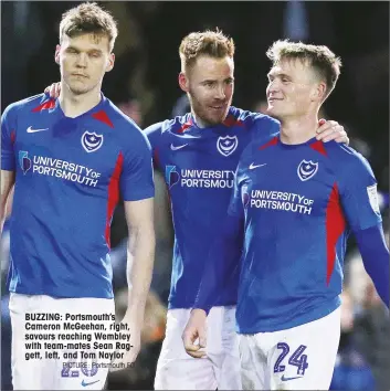  ?? PICTURE: Portsmouth FC ?? BUZZING: Portsmouth’s Cameron McGeehan, right, savours reaching Wembley with team-mates Sean Raggett, left, and Tom Naylor