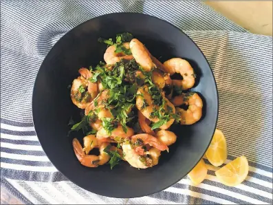  ?? A LITTLE YUMMINESS ?? These delicious spicy shrimp — like scampi with a kick — are equally at home served over rice or pasta, or tucked into tacos.