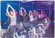  ??  ?? Rhythm Cycling class at Absolute You studio.