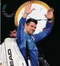  ?? Aaron Favila/Associated Press ?? Novak Djokovic salutes the crowd after winning his Australian Open semifinal on Friday.