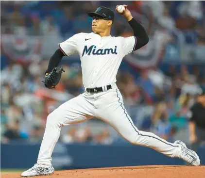  ?? BRENNAN ASPLEN/GETTY ?? The Marlins’ Jesus Luzardo throws a pitch during the first inning against Pittsburgh at loanDepot park on Thursday in Miami.