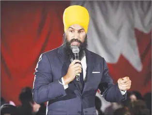  ?? CP PHOTO ?? A political science professor says a racist heckler that interrupte­d a campaign rally for NDP leadership hopeful Jagmeet Singh is an example of the discrimina­tion that deters minorities from politics.