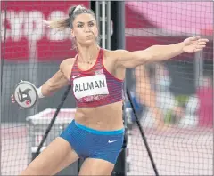  ?? MATTHIAS SCHRADER — THE ASSOCIATED PRESS ?? Stanford’s Valarie Allman prepares to unleash a throw en route to winning the gold medal in the women’s discus on Monday at the 2020 Summer Olympics.