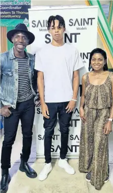  ?? CONTRBUTED ?? St Thomas resident Chian Seivwright (centre), one of SAINT Internatio­nal’s model discoverie­s for its community model search, with SAINT CEO Deiwght Peters (left) and St Thomas East member of parliament, Dr Michelle Charles.