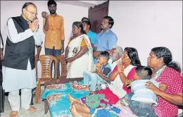  ?? PTI ?? Union minister Arun Jaitley on Sunday visits the family of RSS worker E Rajesh, who was hacked to death allegedly by CPI(M) workers, in Thiruvanan­thapuram.