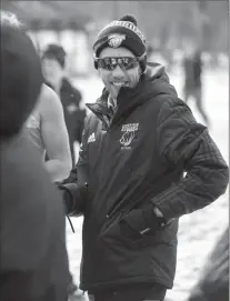  ?? Lethbridge College photo ?? Simon Schaerz, shown here coaching the Lethbridge College Kodiaks cross country running team, has been tracking the physical activities of kids aged 10 to 13 years as part of his research.