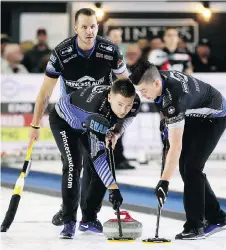  ?? MARK MALONE ?? Former skip Mike McEwan, front left, is relearning how to sweep alongside lead Colin Hodgson, right, and second Derek Samagalski after teaming up with friend and longtime rival Reid Carruthers.