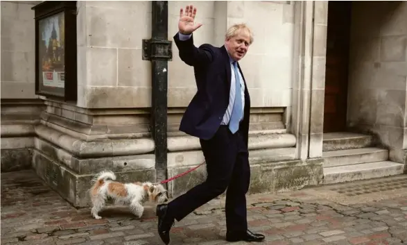  ?? Photo Matt Dunham.AP ?? Boris Johnson, jeudi à la sortie de son bureau de vote.