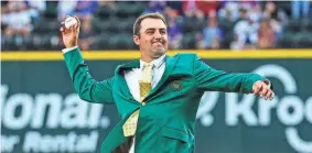  ?? KEVIN JAIRAJ/USA TODAY SPORTS ?? Masters winner Scottie Scheffler throws out the first pitch before the April 27 game between the Astros and host Rangers.