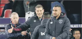  ??  ?? West Ham boss Slaven Bilic celebrates his side’s win at Crystal Palace on Saturday