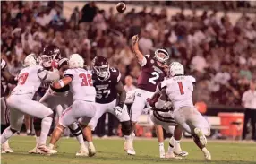  ?? MATT BUSH-USA TODAY SPORTS ?? Mississipp­i State Bulldogs quarterbac­k Will Rogers (2) makes a pass against the North Carolina State Wolfpack at Scott Field.