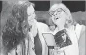  ?? Ron Vignone ?? PRIVATE EYE Lili (Alex Sedrowski), left, romances Renee (Cathy Arden) in “Why We Have a Body.”