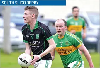  ??  ?? Gary Walsh of Curry in action with Tourlestra­ne’s Barry Walsh. Pic: Tom Callanan.