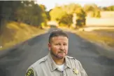  ?? Gabrielle Lurie / The Chronicle ?? Lake County Sheriff Brian Martin on Clayton Creek Road, where Pashilk started the disastrous Clayton Fire.