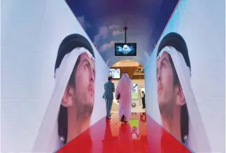  ??  ?? A model of a new security tunnel at the Gitex 2017 exhibition that will allow passengers departing Dubai to avoid security delays as their face and iris are scanned using 80 hidden cameras. A new report from PwC points to an improving outlook for the...