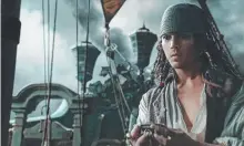  ??  ?? Above: Young Jack Sparrow (Anthony De La Torre) on The Black Pearl, pictured right at the film’s Helensvale set.
