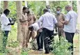  ??  ?? Cops, experts inspect the contents (right) of the parcel in Thanjavur
