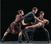  ?? PHOTO BY CHRIS HARDY ?? Smuin dancers Terez Dean Orr, left, Ben Needham-wood, top, Peter Kurta, bottom, and Ian Buchanan in James Kudelka’s “The Man in Black,” set to the music of Johnny Cash, is part of Smuin’s Dance Series 1 running through March 1at the Mountain View Center for the Performing Arts.