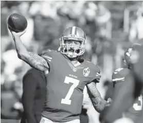  ?? ASSOCIATED PRESS FILE PHOTO/ ?? Colin Kaepernick thrived under current Ravens offensive coordinato­r Greg Roman’s system when Roman coached in San Francisco.