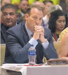  ??  ?? UNM Athletic Director Eddie Nuñez, left, and UNM President Garnett Stokes at the July 19 Regents meeting.