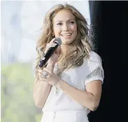  ?? JEFF SCHEAR/Getty Images for Kohl’s ?? When she’s not recording or acting or working TV shows like American Idol, Jennifer Lopez stays busy. Here, she hosts a Kohl’s department store fashion show for her clothing line.