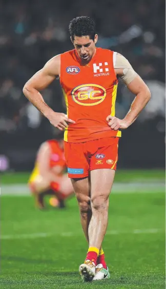  ??  ?? Michael Rischitell­i is yet to reveal his plans for 2018 but the veteran still has more work to do this season with the Suns NEAFL side. Pictures: GETTY IMAGES