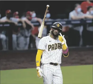  ?? ASSOCIATED PRESS ?? IN THIS OCT. 1, 2020, FILE PHOTO, San Diego Padres’ Fernando Tatis Jr. tosses his bat after hitting a two-run home run during the seventh inning of Game 2 of the team’s National League wild-card series against the St. Louis Cardinals in San Diego.