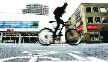  ?? TARA WALTON/TORONTO STAR FILE PHOTO ?? Using pedal power can be an efficient way to commute and slash spending, but you should ease into it.