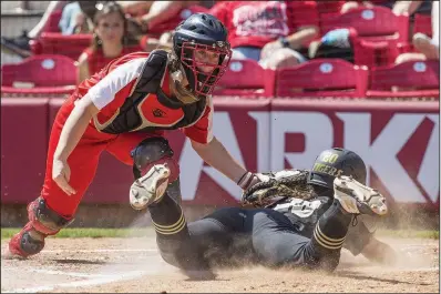  ?? NWA Democrat-Gazette/BEN GOFF ?? Cabot catcher Jaden Potter (left) tags out Bentonvill­e’s Emily Perry at home plate during the fourth inning of the Lady Panthers’ 5-3 victory Friday in the Class 6A softball state championsh­ip game at Bogle Park in Fayettevil­le.